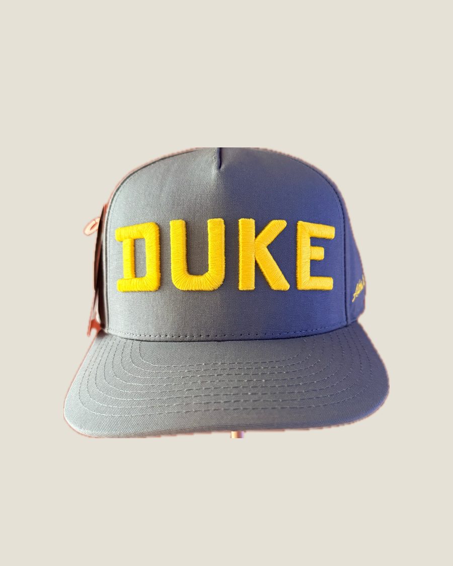 Duke wordmark cap, Pukka · Gold on grey